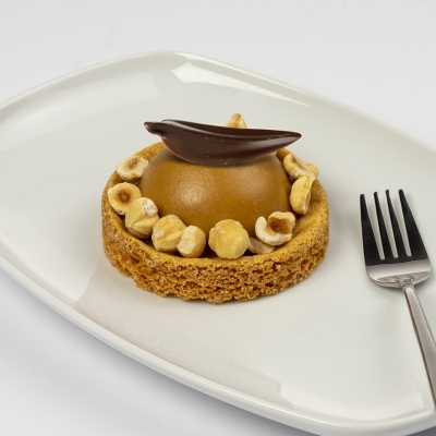 caramel bavarois met sinaasappel afgewerkt met hazelnootjes caramel bavarois met sinaasappel afgewerkt met hazelnootjes